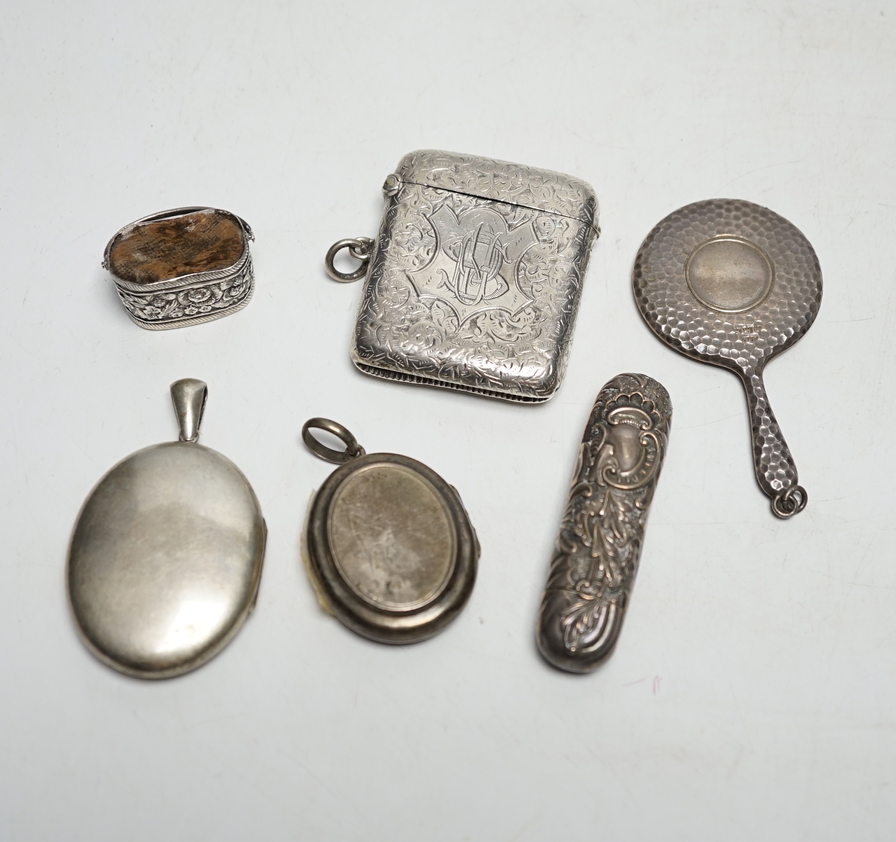 Sundry small silver and white metal items including a George V handbag mirror, vesta case, needle case, basket pin cushion, etc.